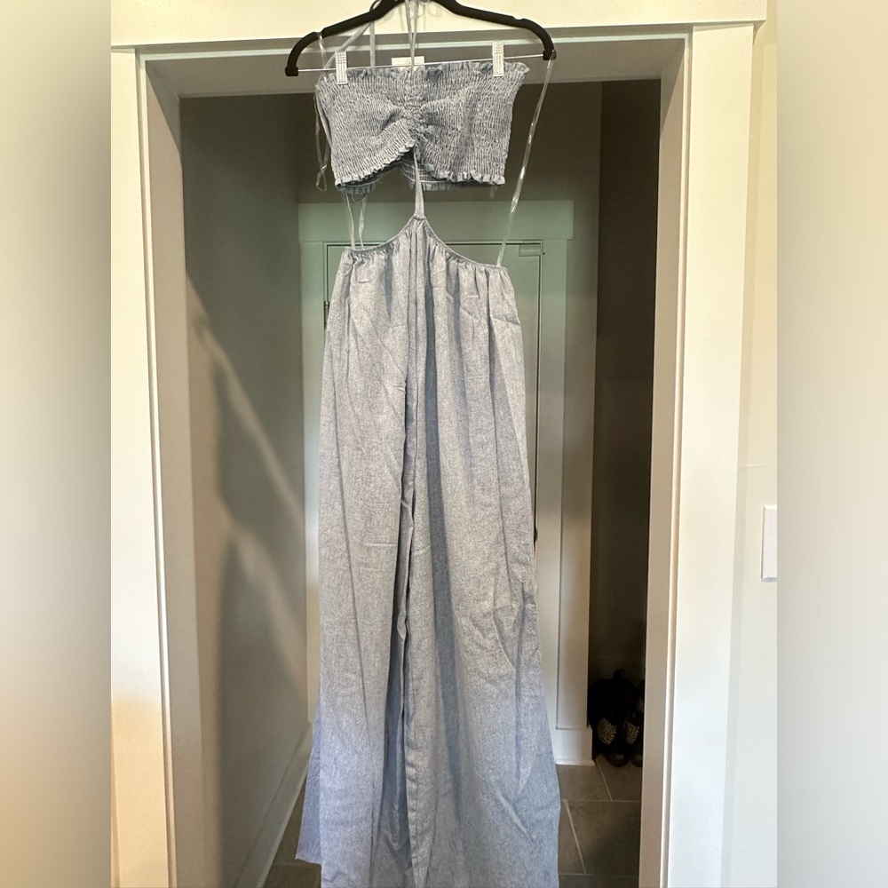 Model height is 5’8 so you can see how it hits. Very long. Linen material